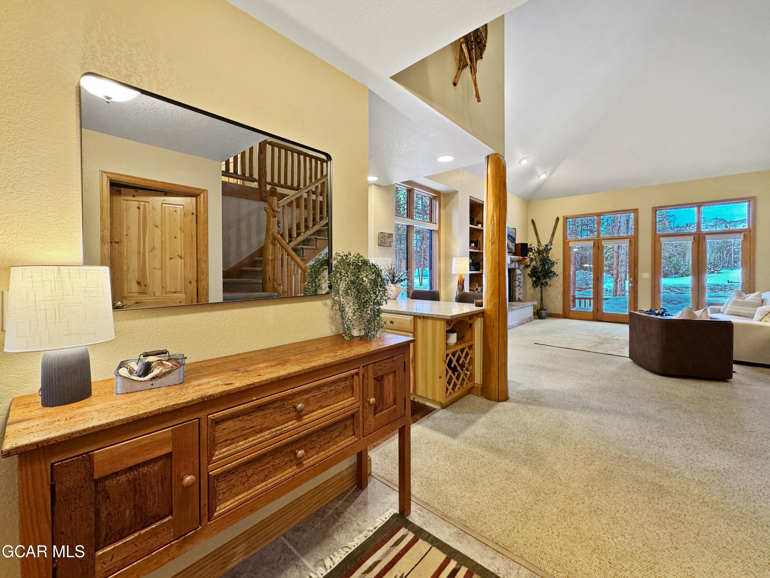 1232 Gcr 8 Tabernash, CO 80478 - Photo 3 of 51 a spacious bathroom with a granite countertop sink a mirror and bathtub