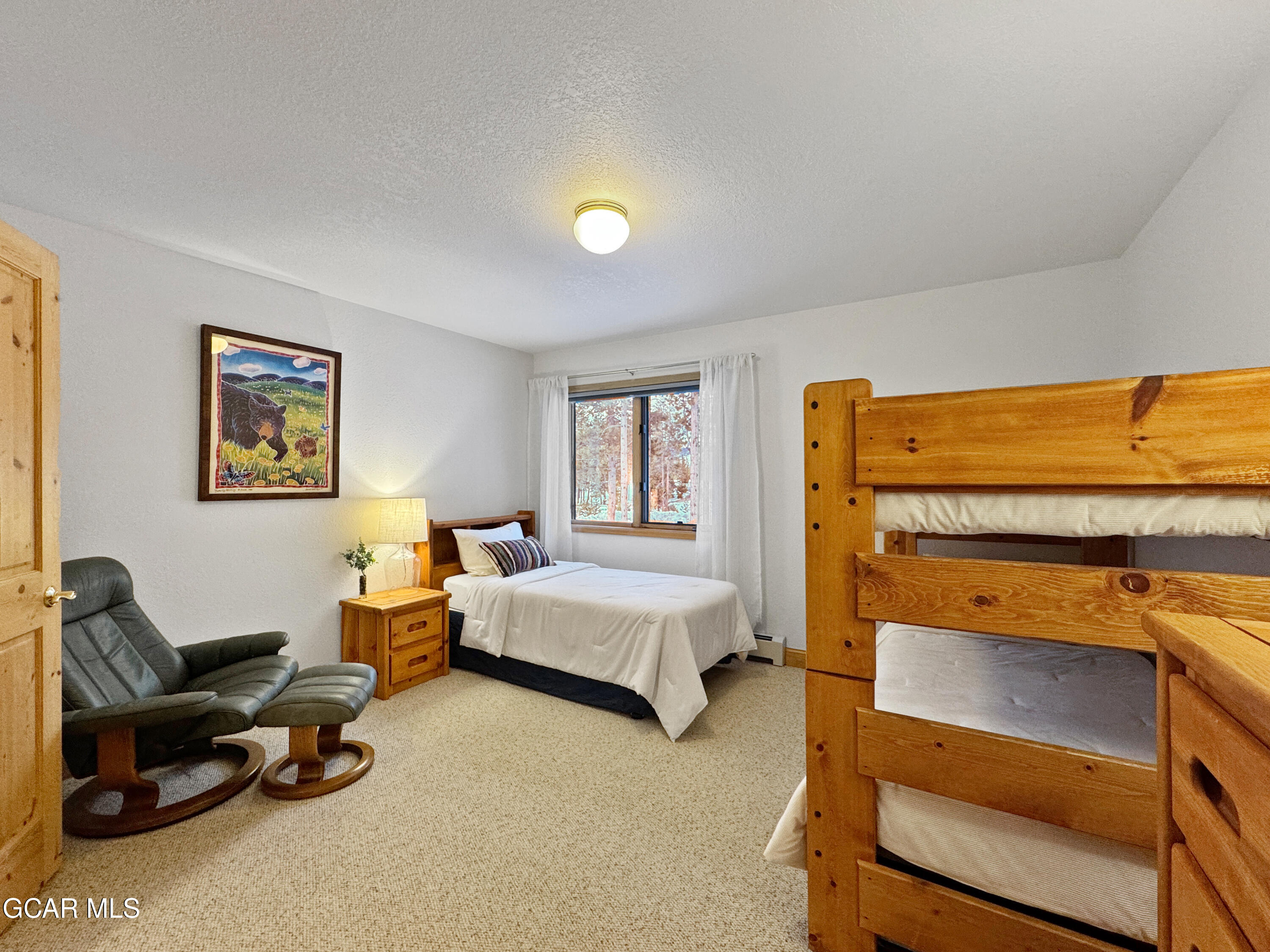1232 Gcr 8 Tabernash, CO 80478 - Photo 33 of 51 a bedroom with a bed and a couch