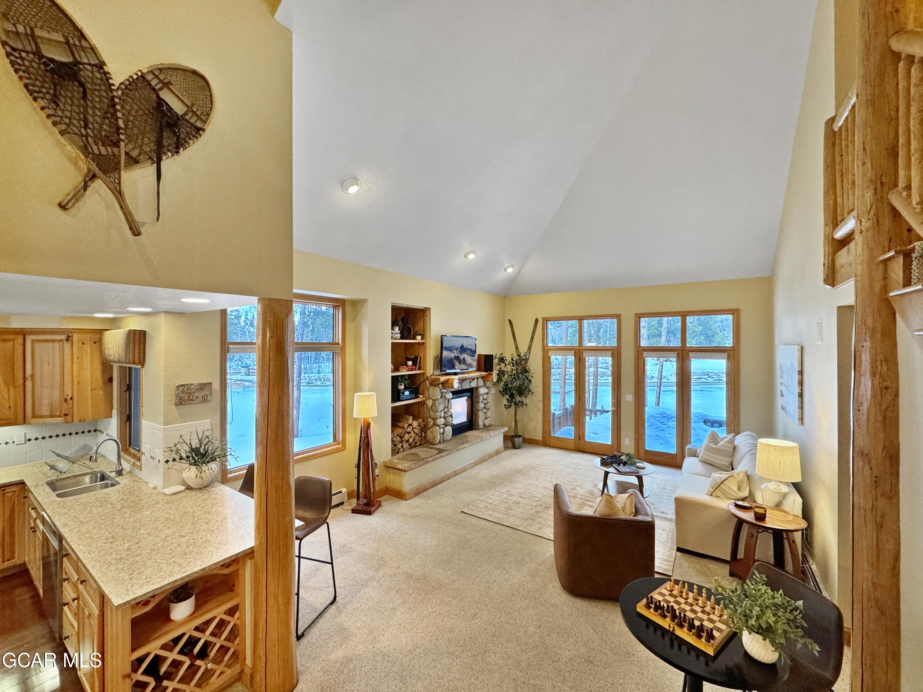 1232 Gcr 8 Tabernash, CO 80478 - Photo 4 of 51 a living room with furniture and a floor to ceiling window