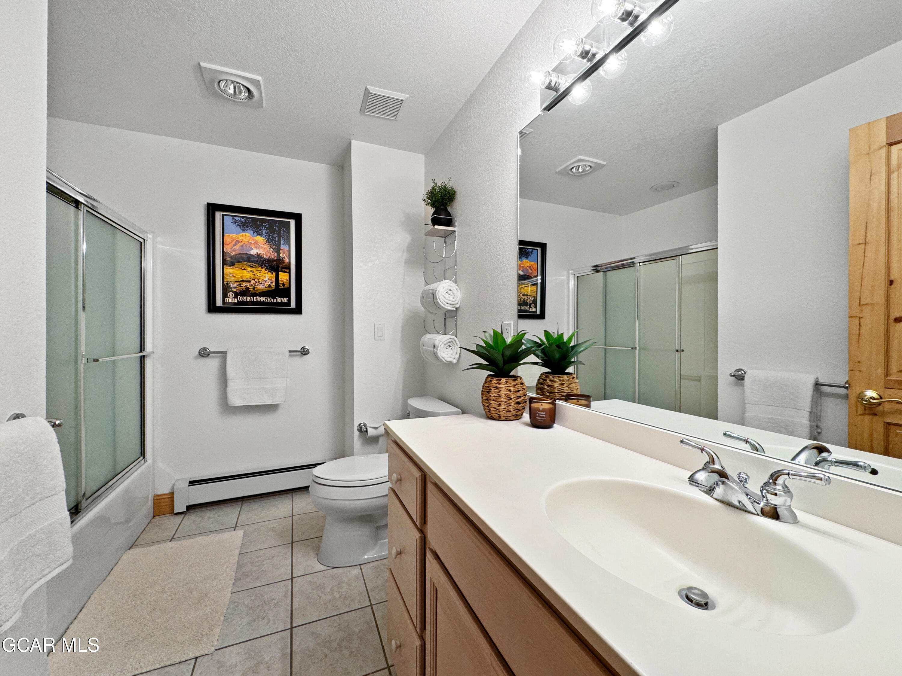 1232 Gcr 8 Tabernash, CO 80478 - Photo 42 of 51 a bathroom with a sink a toilet and shower