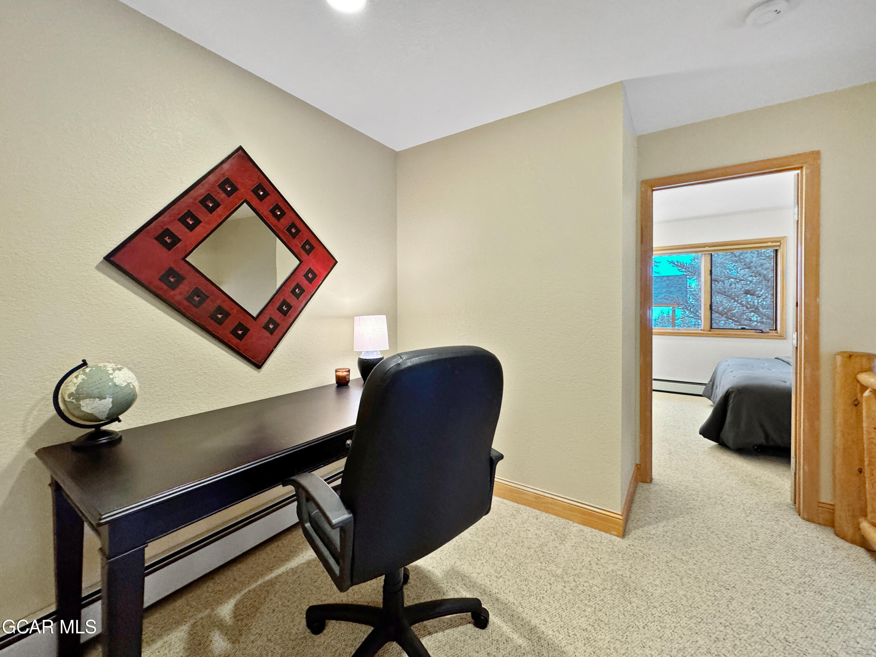 1232 Gcr 8 Tabernash, CO 80478 - Photo 45 of 51 a view of a workspace with furniture and a lamp