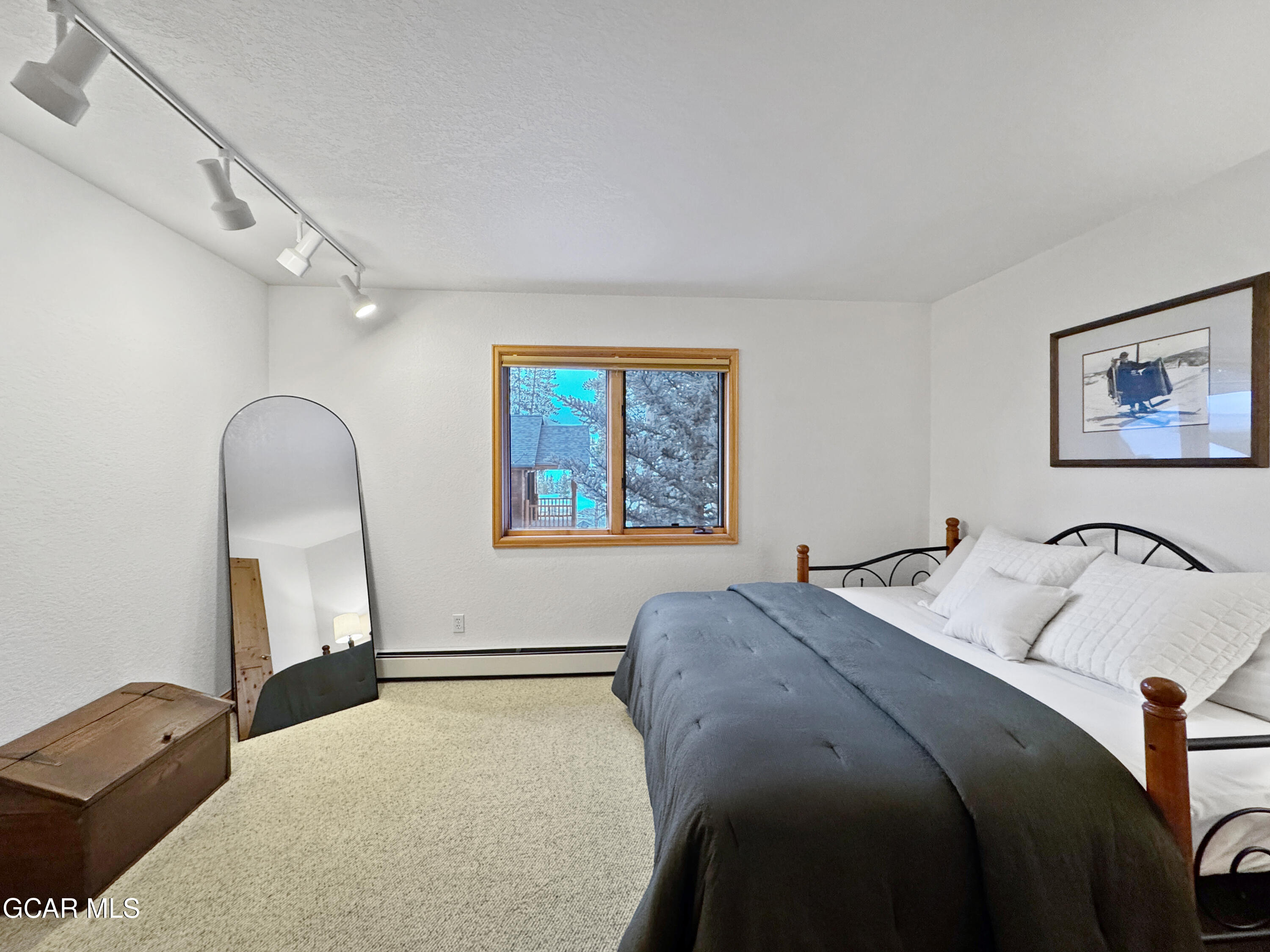 1232 Gcr 8 Tabernash, CO 80478 - Photo 46 of 51 a bedroom with a bed and a window