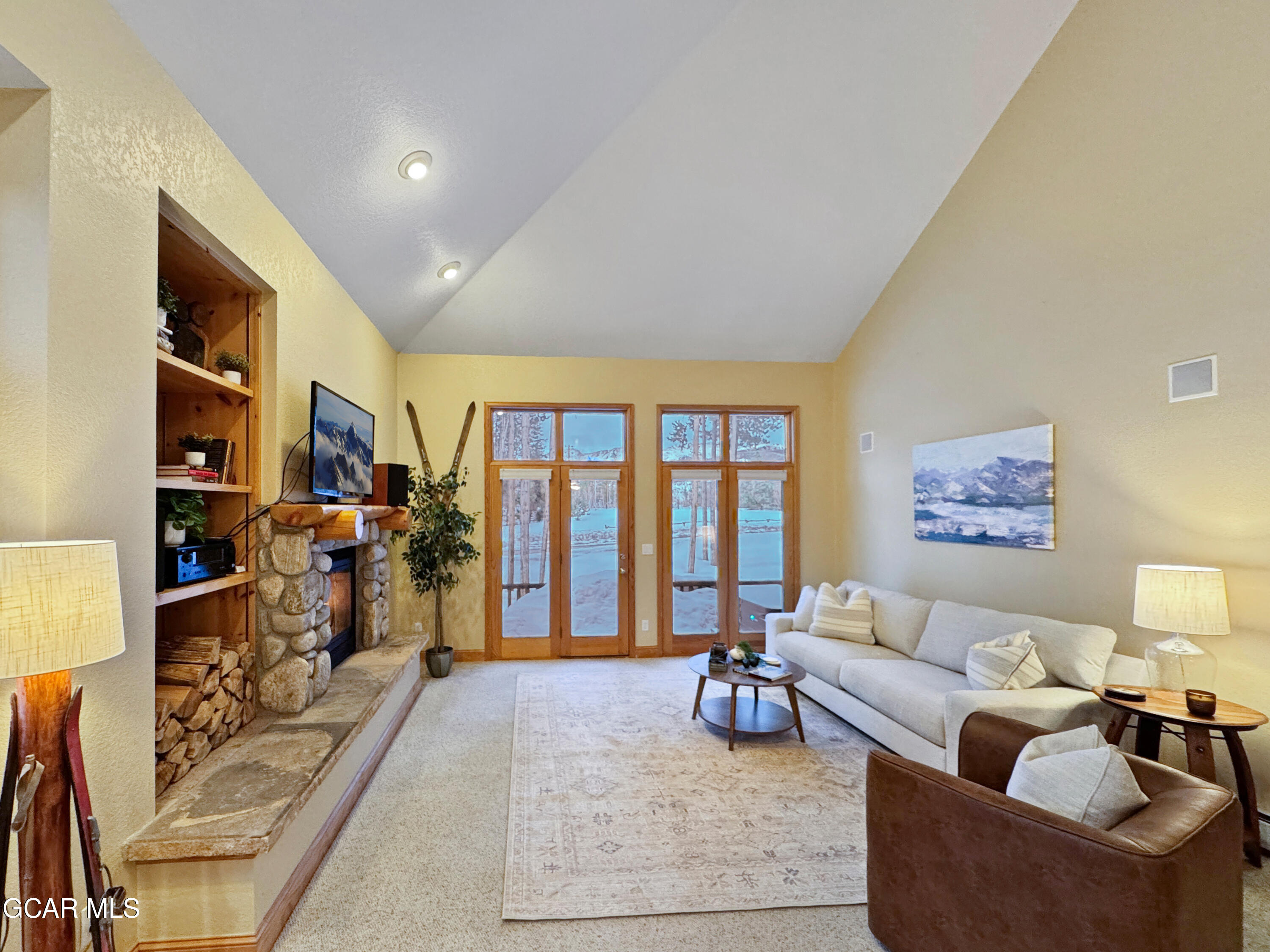 1232 Gcr 8 Tabernash, CO 80478 - Photo 48 of 51 a living room with furniture a bookshelf and a window