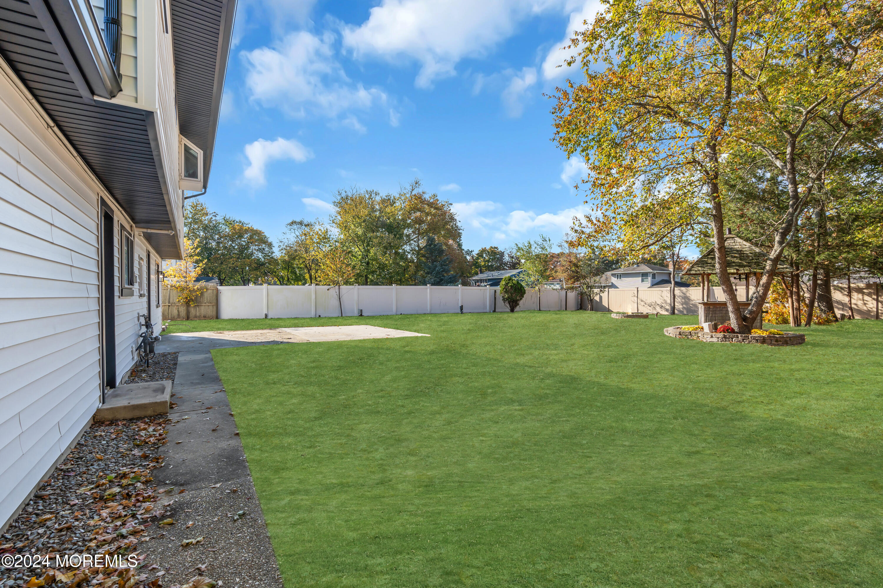 44 Lexington Road Howell, NJ 07731 - Photo 45 of 45 a view of yard with swimming pool and green space