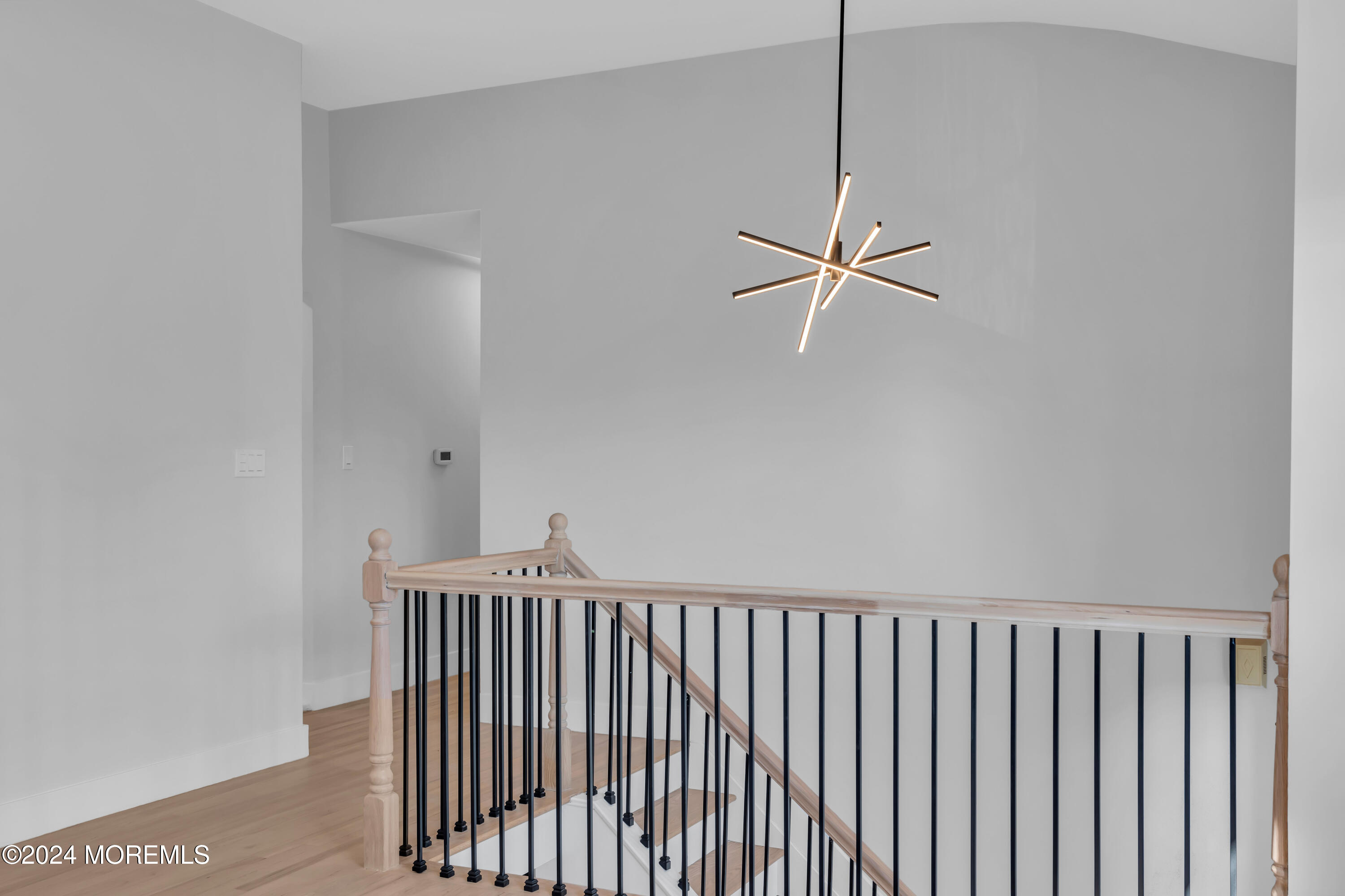 44 Lexington Road Howell, NJ 07731 - Photo 6 of 45 a view of a hallway with a ceiling fan