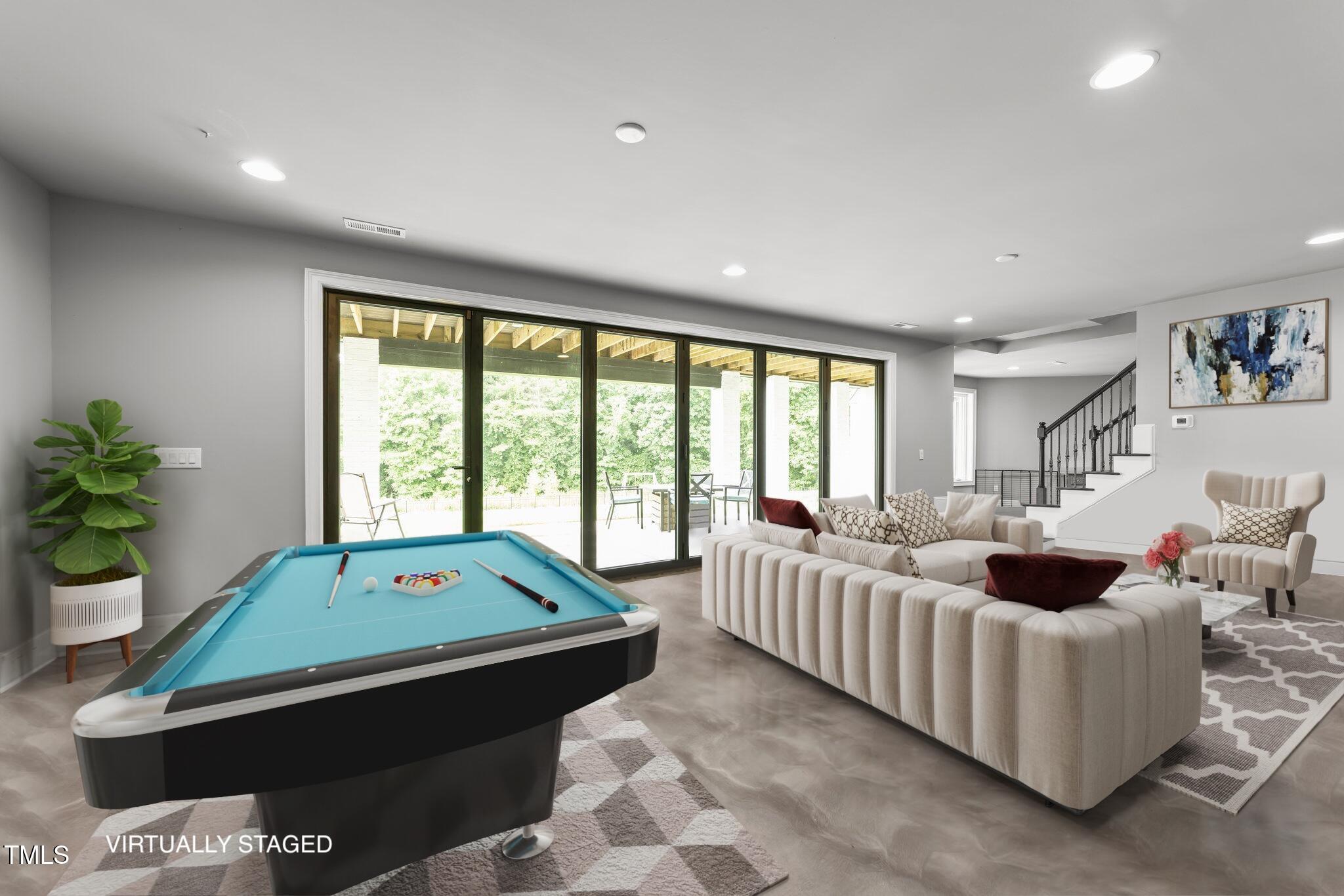 2220 Inwood Landing Court Raleigh, NC 27603 - Photo 22 of 28 Basement entertaining space.