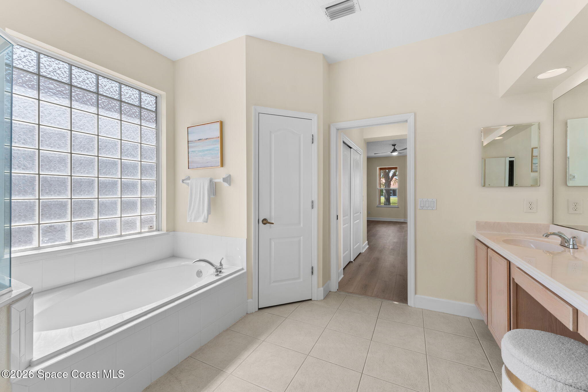 541 Oceanside Boulevard Indialantic, FL 32903 - Photo 22 of 51 a bathroom with a tub shower and sink