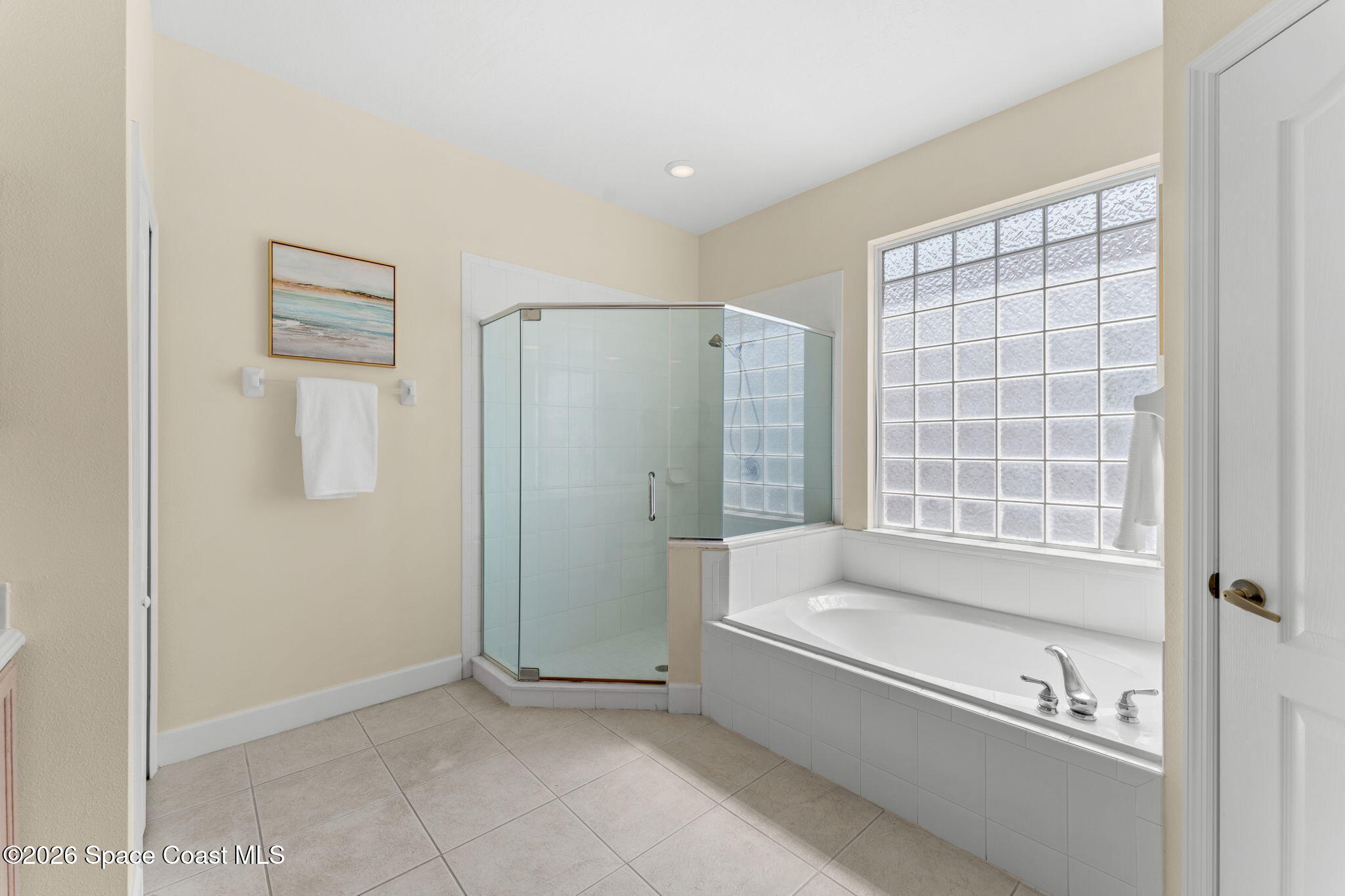 541 Oceanside Boulevard Indialantic, FL 32903 - Photo 24 of 51 a bathroom with a bathtub and a shower