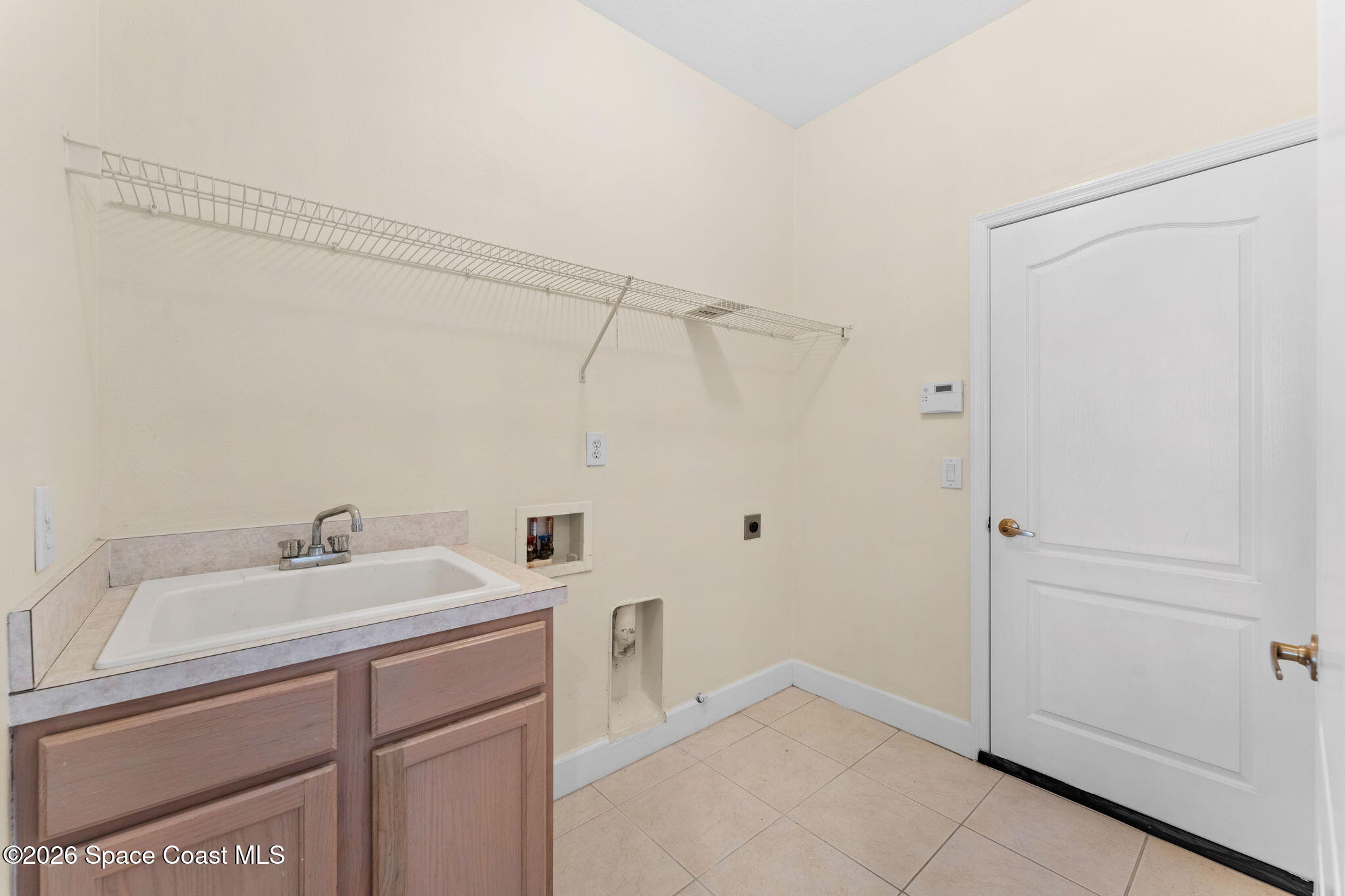 541 Oceanside Boulevard Indialantic, FL 32903 - Photo 29 of 51 a bathroom with a sink and a mirror