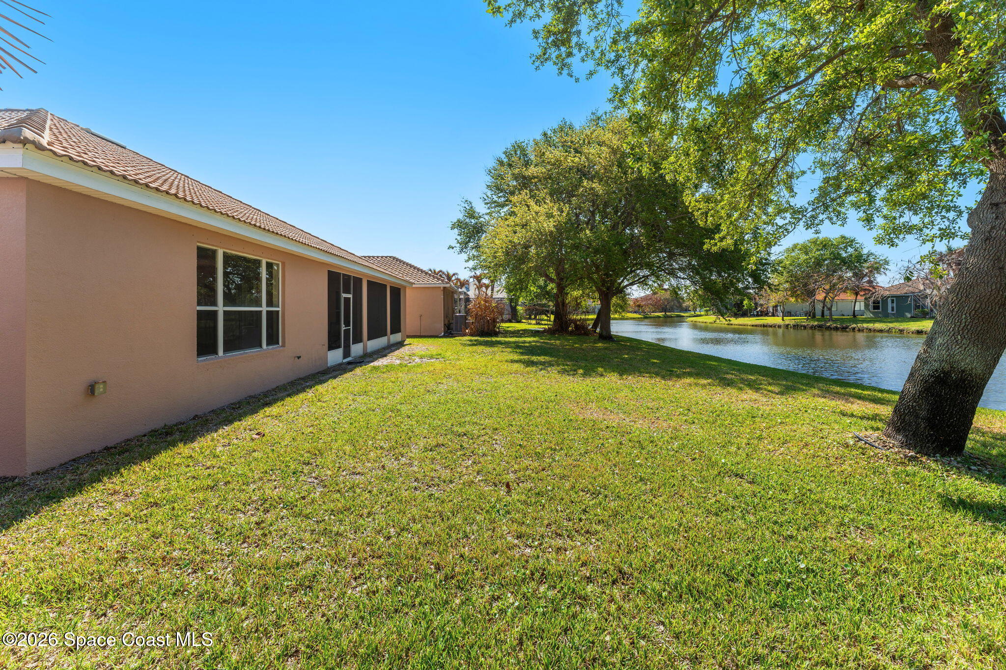 541 Oceanside Boulevard Indialantic, FL 32903 - Photo 37 of 51 a view of a house with a yard