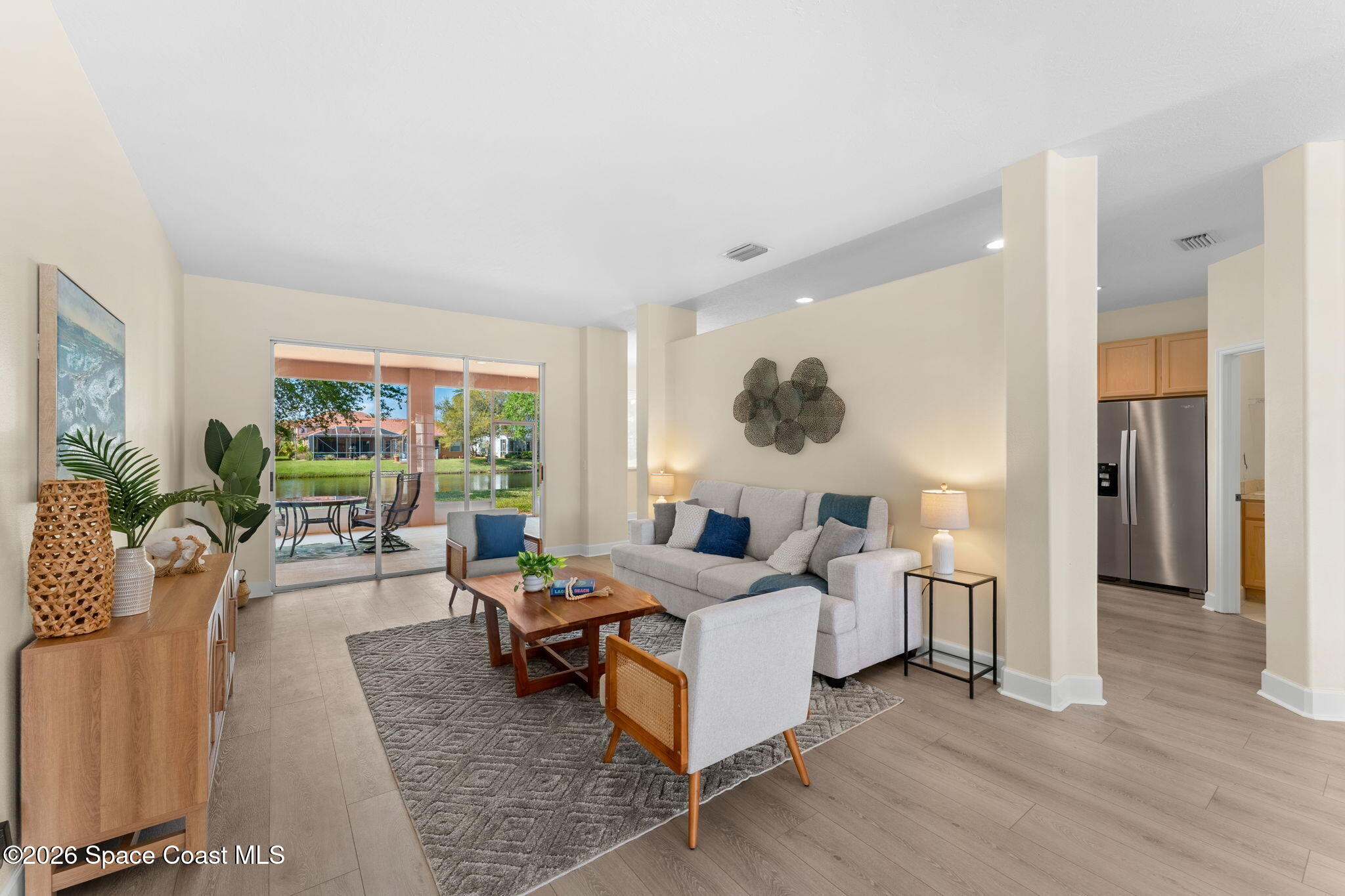 541 Oceanside Boulevard Indialantic, FL 32903 - Photo 5 of 51 a living room with furniture and a large window