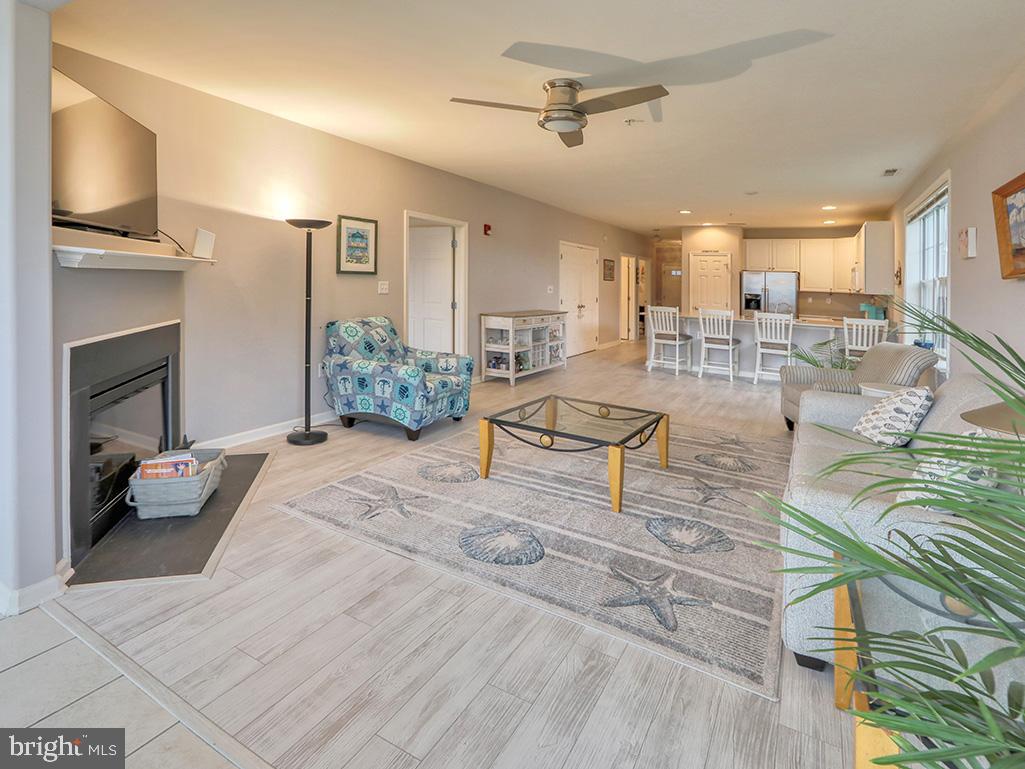 17432 Slipper Shell Way, Unit 9 Lewes, DE 19958 - Photo 12 of 44 Great room with fireplace