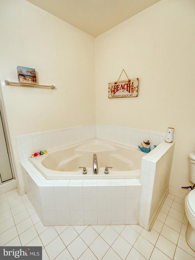 17432 Slipper Shell Way, Unit 9 Lewes, DE 19958 - Photo 24 of 44 Primary bath with soaking tub