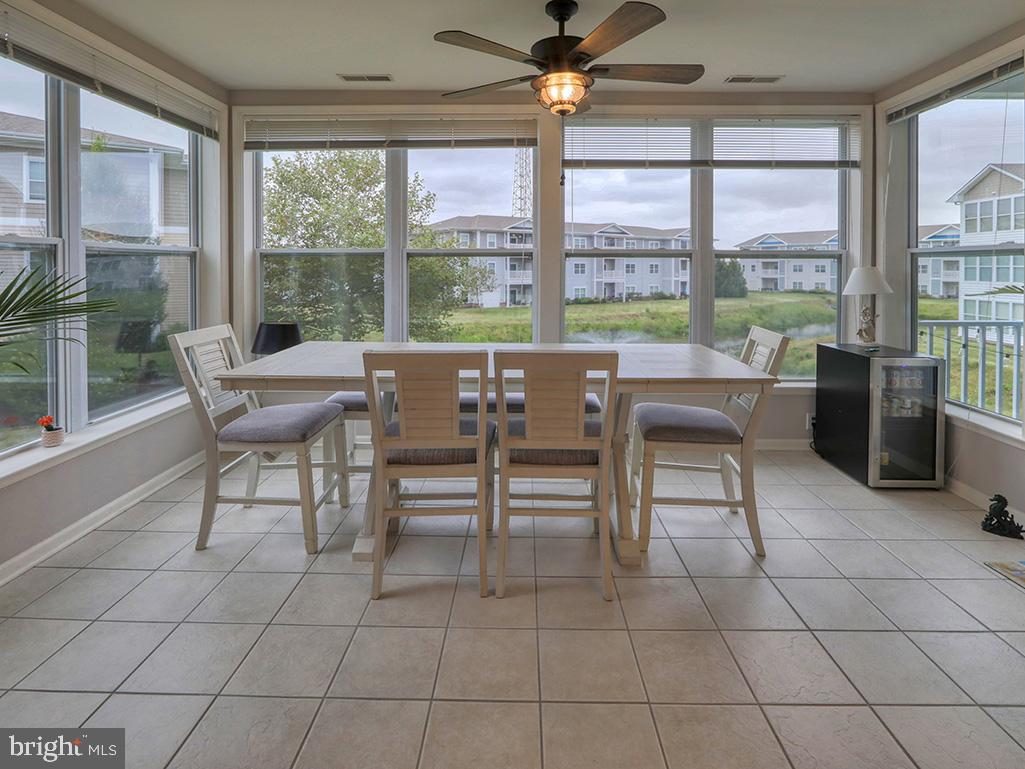17432 Slipper Shell Way, Unit 9 Lewes, DE 19958 - Photo 30 of 44 Dining area/sunroom