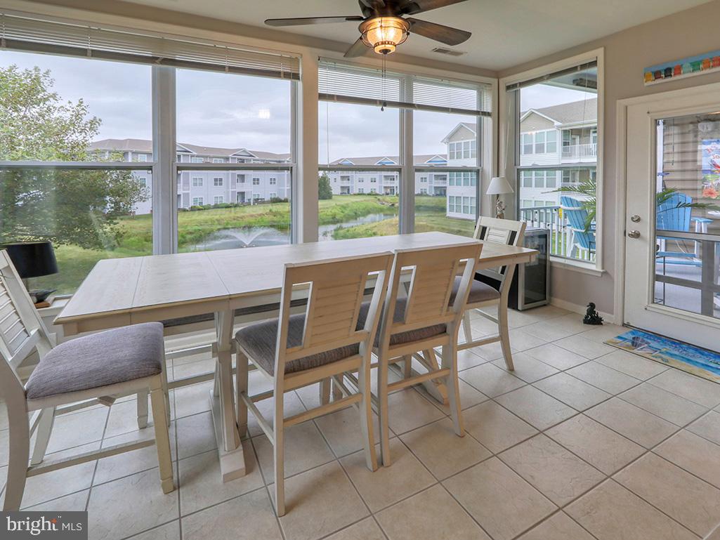 17432 Slipper Shell Way, Unit 9 Lewes, DE 19958 - Photo 31 of 44 Dining area with balcony access