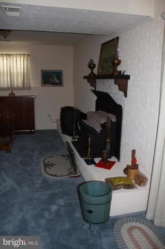 213 Atlanta Road Pasadena, MD 21122 - Photo 11 of 23 Fireplace