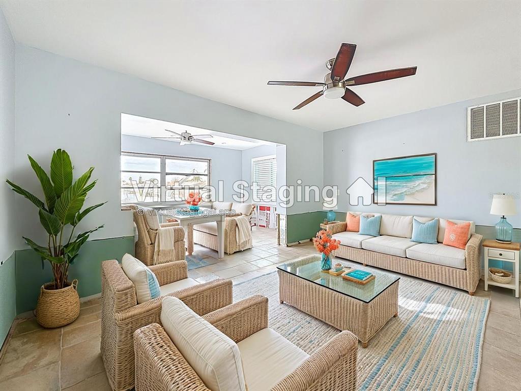 4869 Shell Stream Boulevard New Port Richey, FL 34652 - Photo 33 of 46 a living room with furniture and a potted plant
