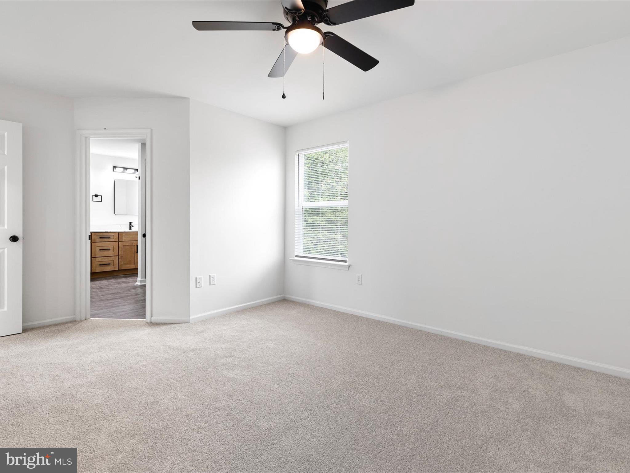 14 3 Rivers Court Newark, DE 19702 - Photo 14 of 21 a view of an empty room with a window