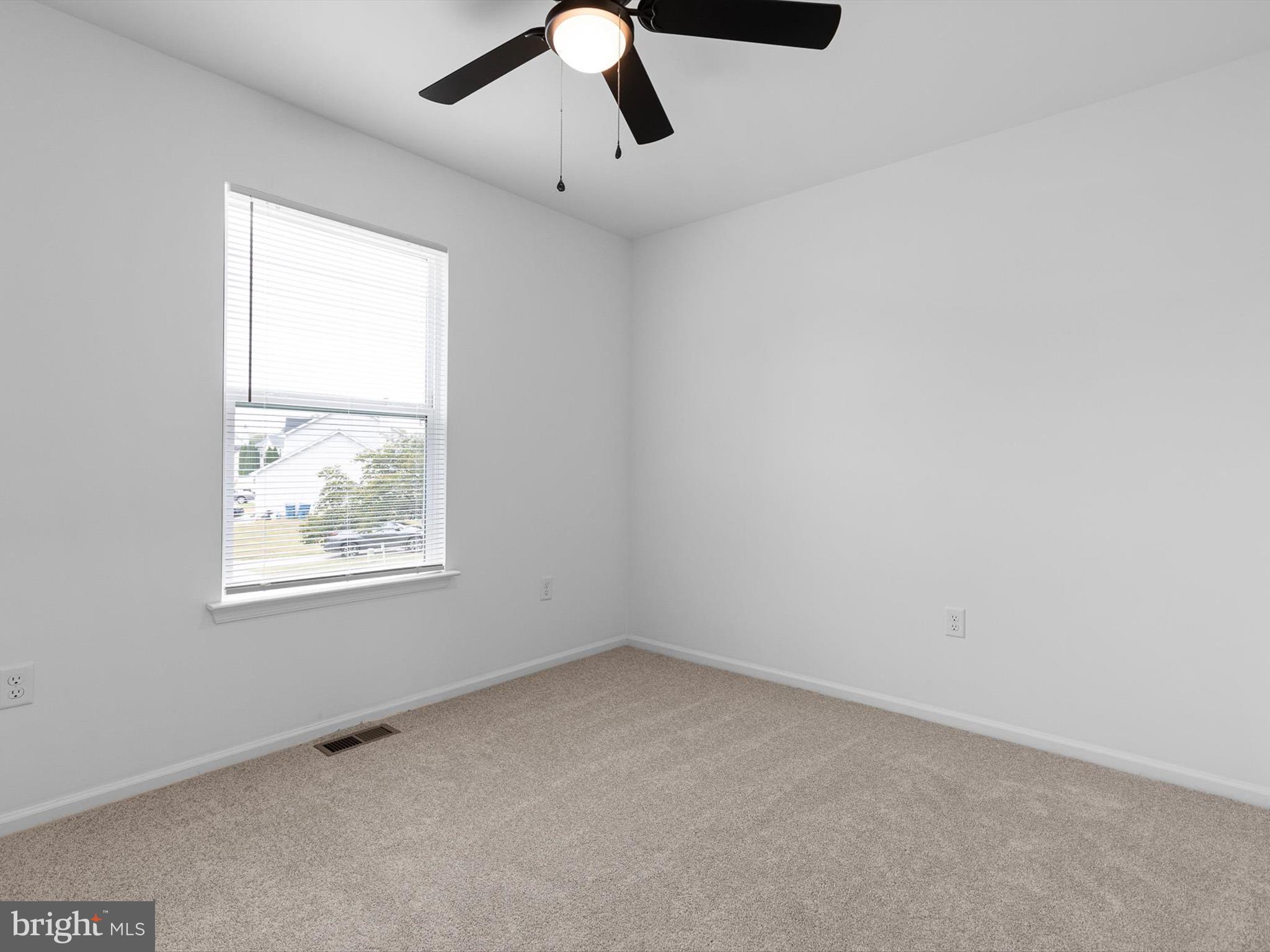 14 3 Rivers Court Newark, DE 19702 - Photo 18 of 21 an empty room with a window