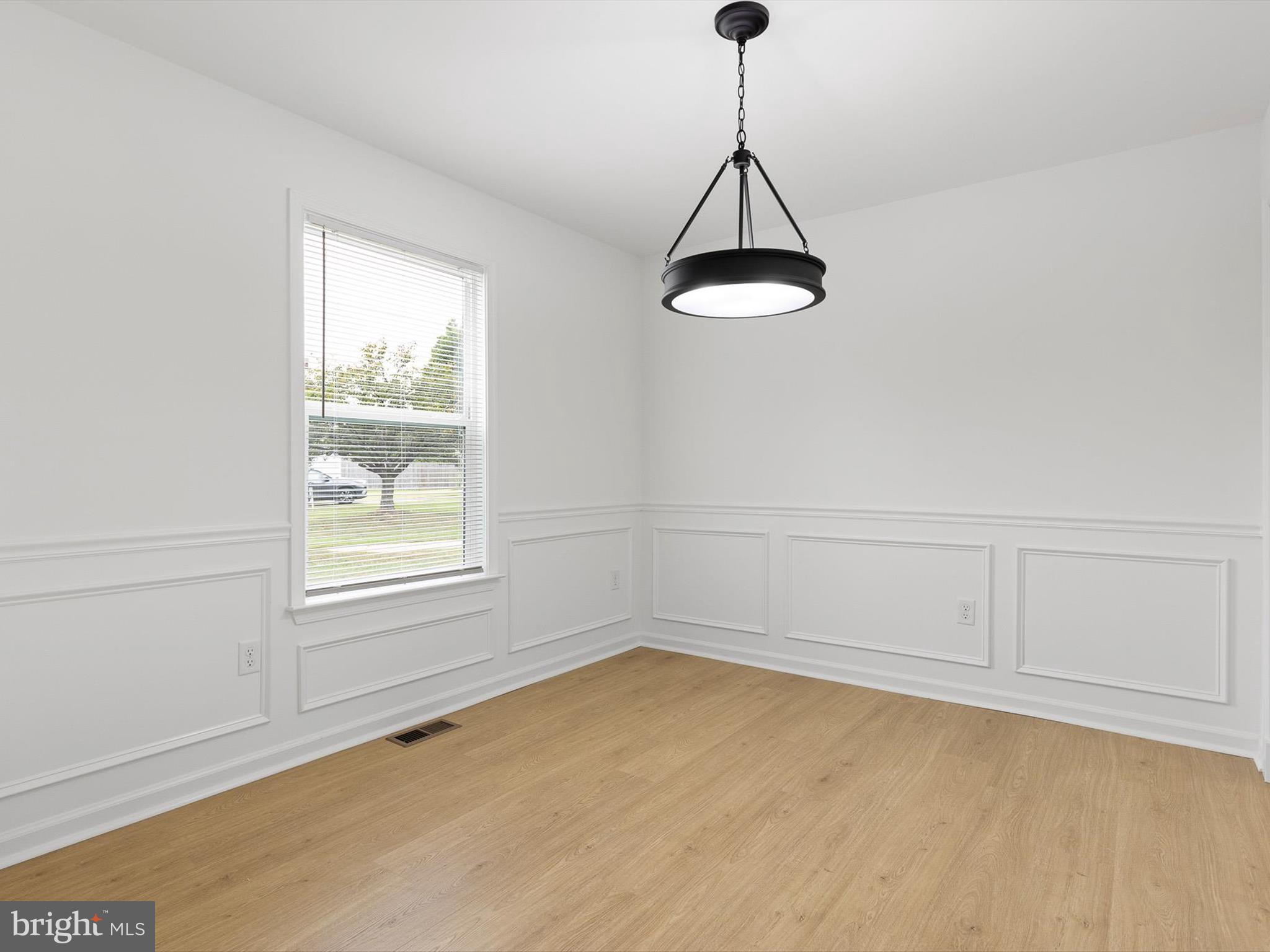 14 3 Rivers Court Newark, DE 19702 - Photo 9 of 21 a view of a room with a window and a ceiling fan