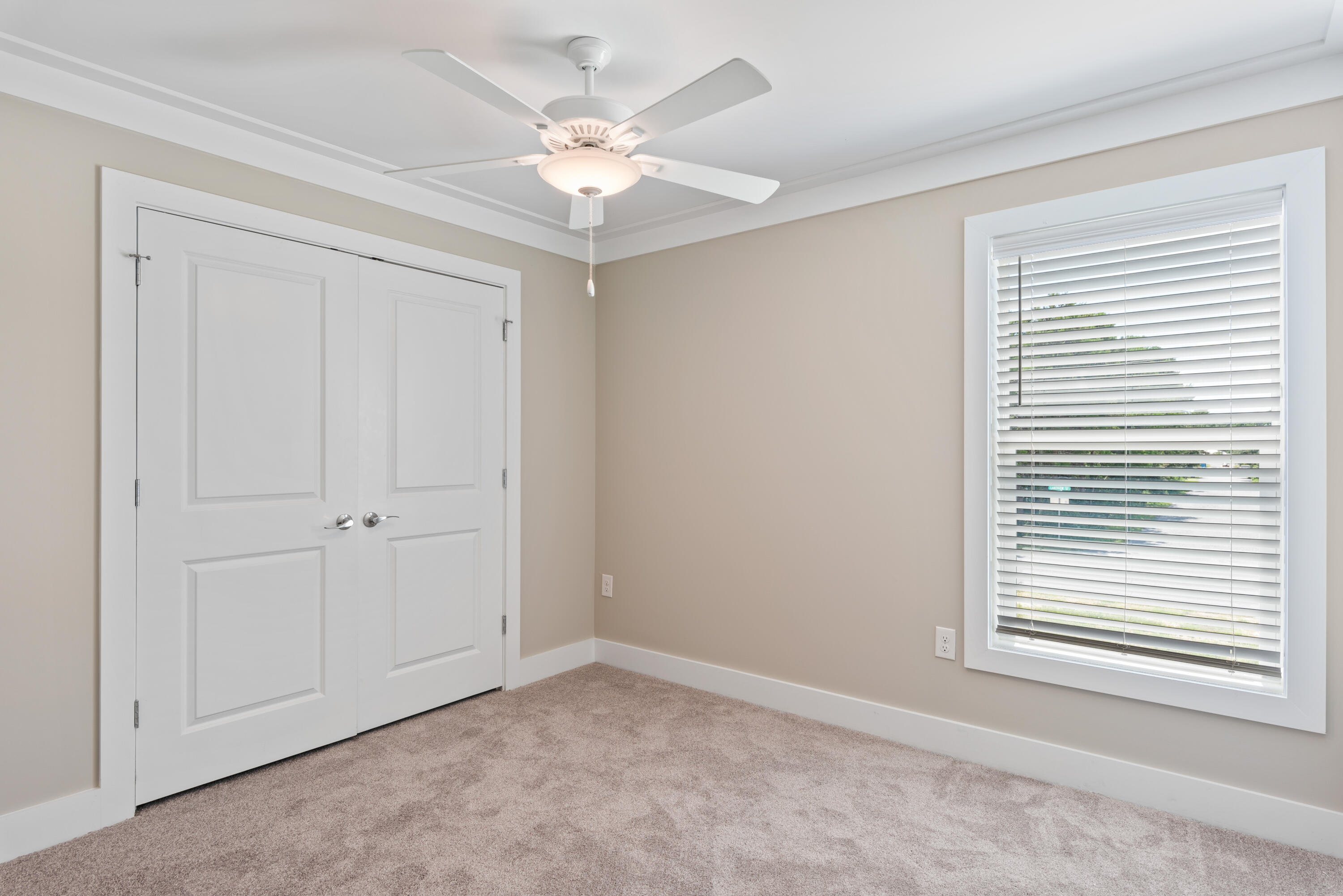 22801 Ann Miller Road Panama City Beach, FL 32413 - Photo 22 of 52 a view of an empty room with a window