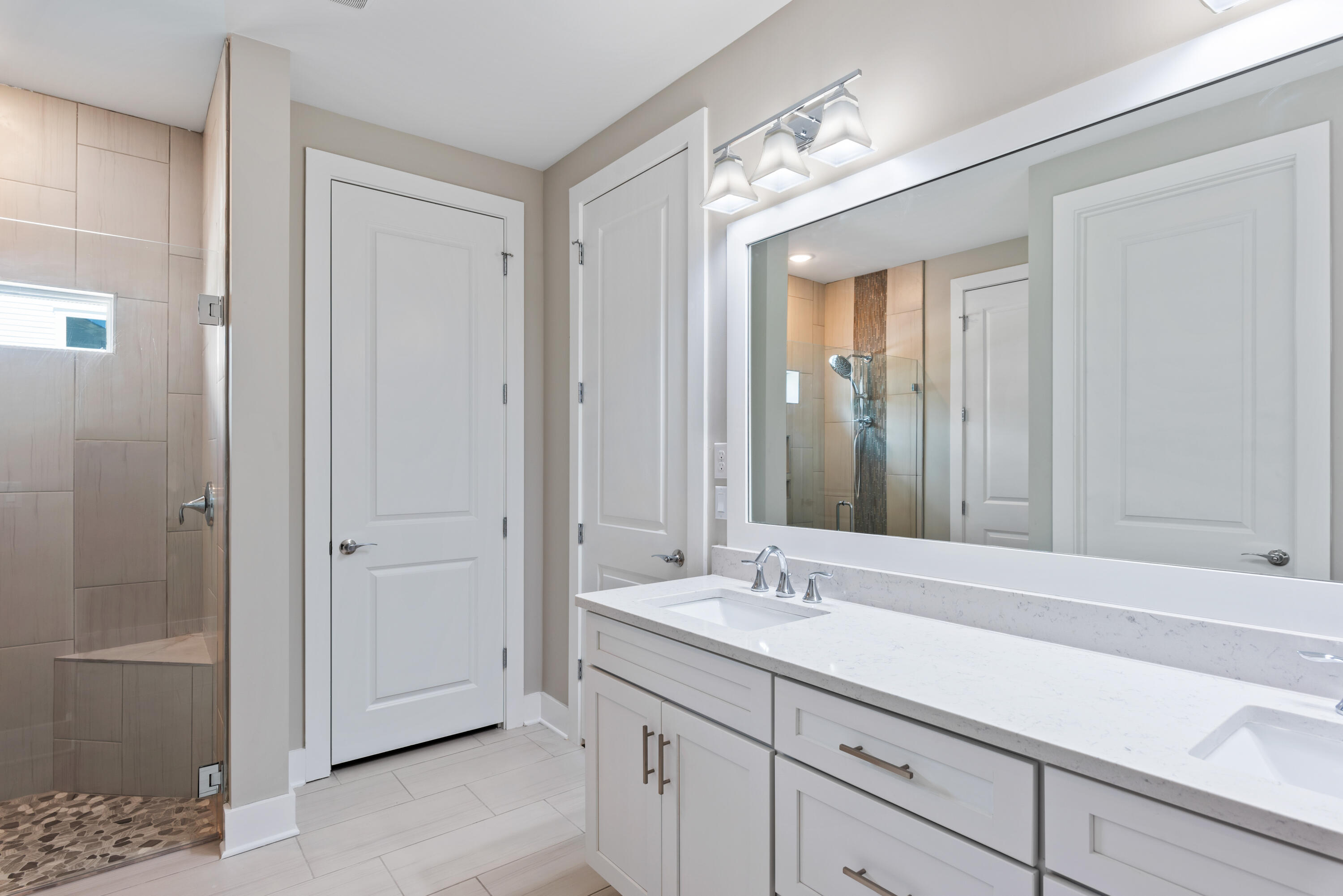 22801 Ann Miller Road Panama City Beach, FL 32413 - Photo 9 of 52 a bathroom with a sink and a mirror