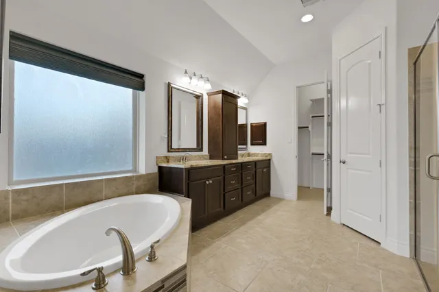 $695,000 | 18610 Winterton Cliff Court, Cypress, TX 77429