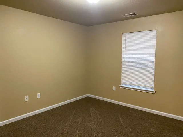 an empty room with a workbench