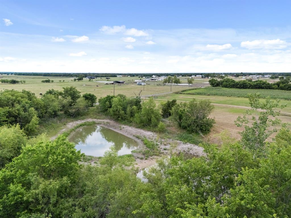 300 Grellhesl Road West, TX 76691 - Photo 30 of 35 a view of a lake with houses in the back