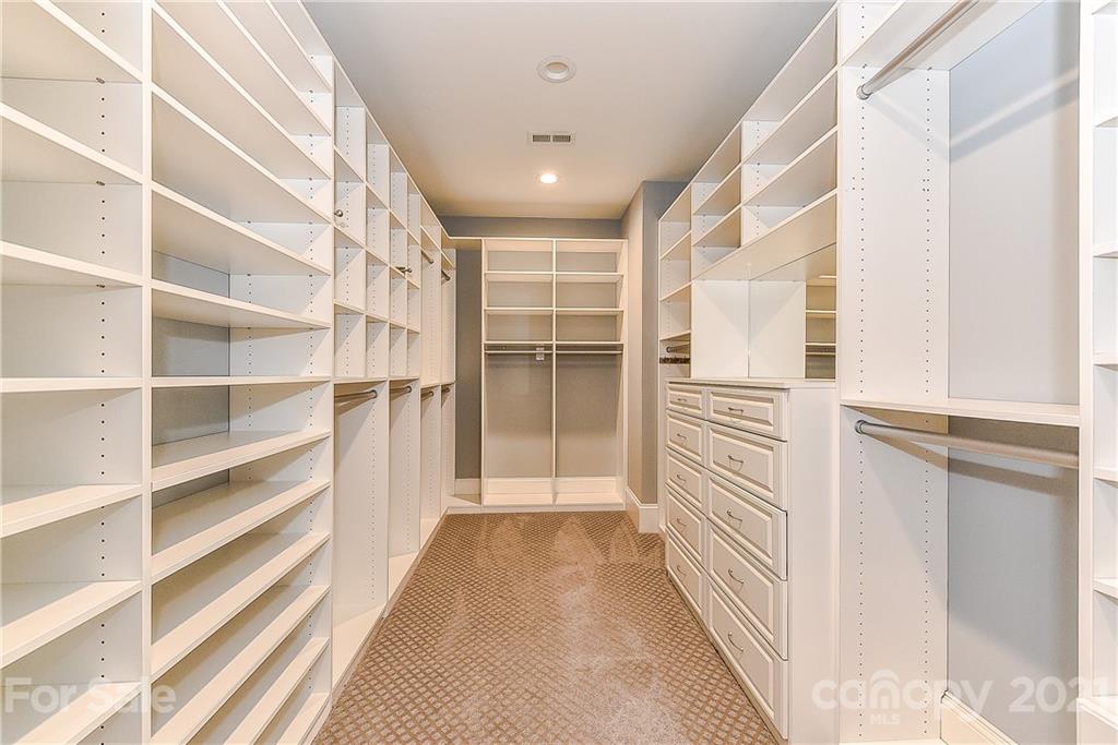 2001 Ferncliff Road Charlotte, NC 28211 - Photo 14 of 24 a view of a hallway with wooden floor and windows