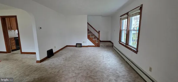 a view of a hallway with staircase