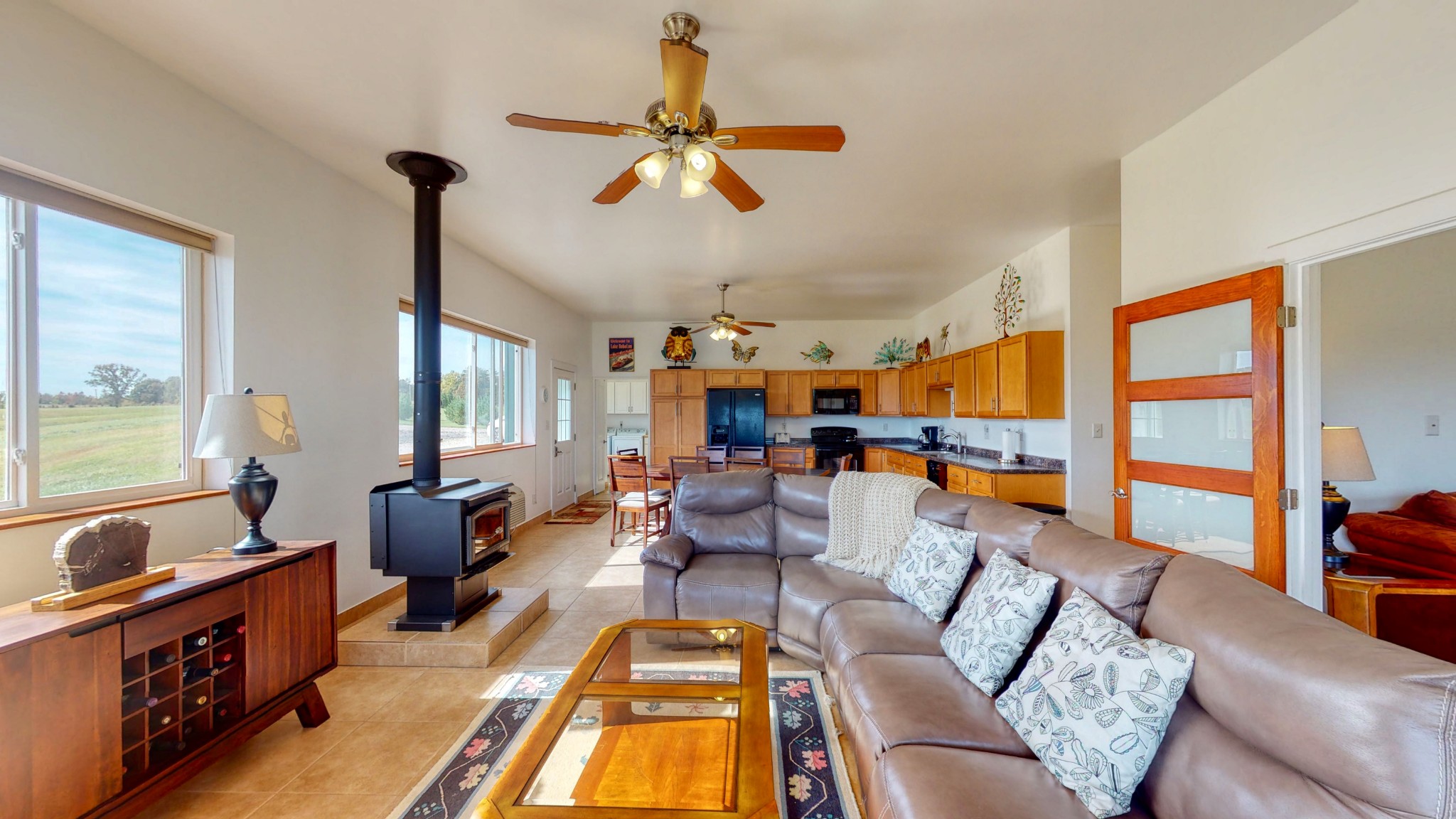 650 Humphrey Road Huntingdon, TN 38344 - Photo 7 of 24 a living room with furniture fireplace and a large window