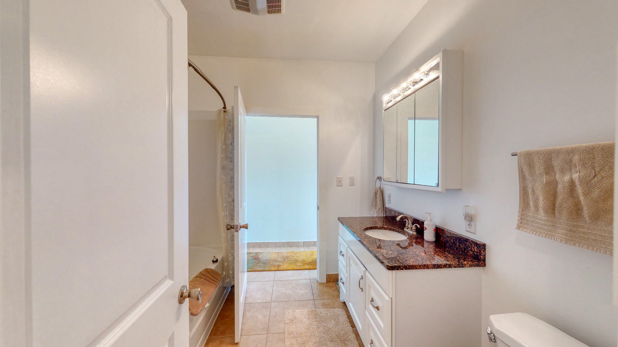 650 Humphrey Road Huntingdon, TN 38344 - Photo 10 of 24 a bathroom with a sink toilet vanity and tub
