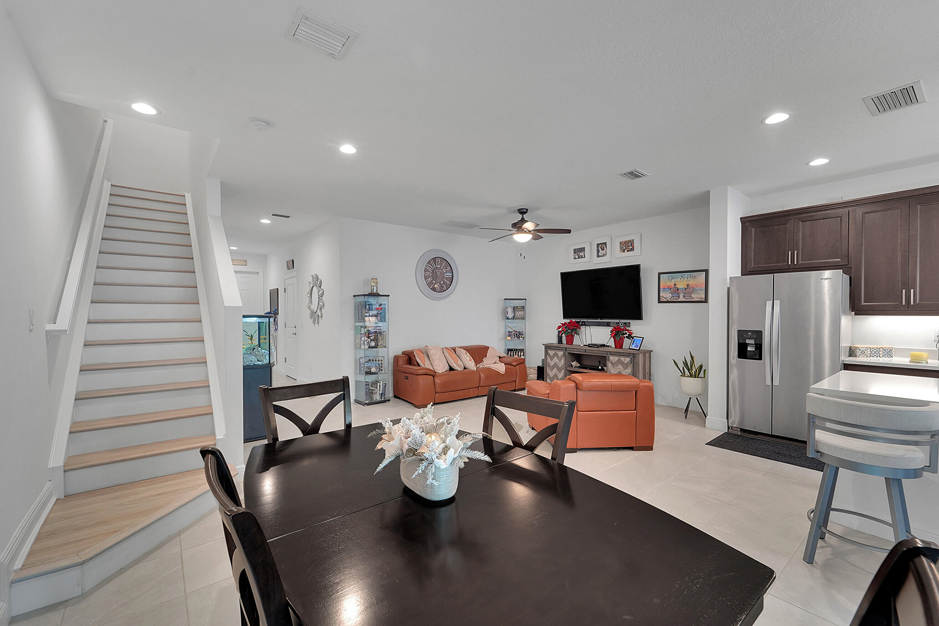 1821 Sandpiper Pointe Place, Unit 1821 Deerfield Beach, FL 33442 - Photo 9 of 24 a living room with furniture kitchen and a flat screen tv