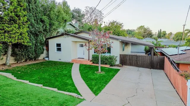 a house view with a garden space
