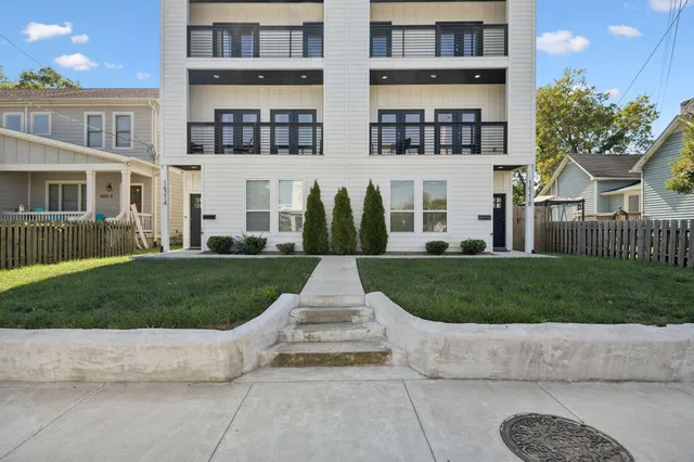 a front view of a building with street view