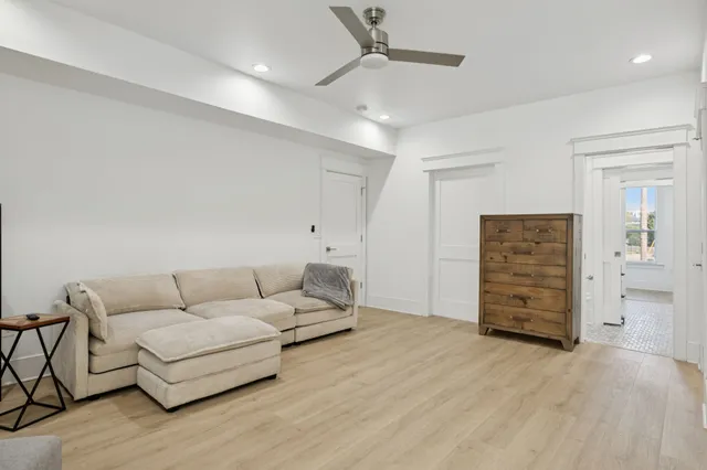 a kitchen with stainless steel appliances a refrigerator sink and microwave