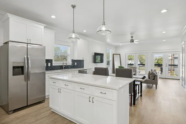 a kitchen with a stove and a microwave