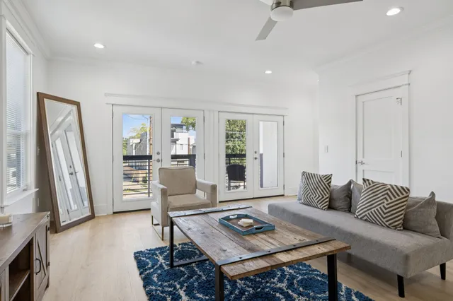 a bedroom with a bed and a mirror