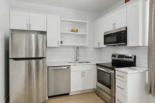 a view of balcony with furniture