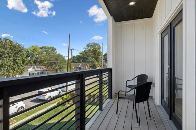 a view of a house with a yard and garage