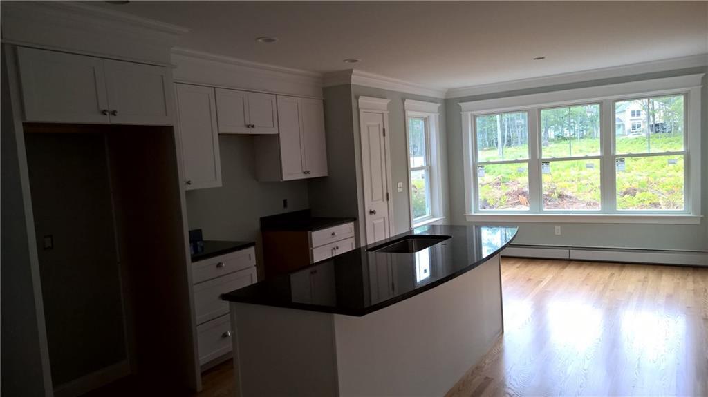 10 Roaring Rock Road Saco, ME 04072 - Photo 3 of 8 Kitchen and dining area. Granite...