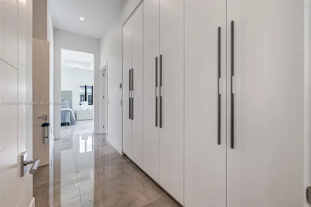 a bedroom with a bed and a table