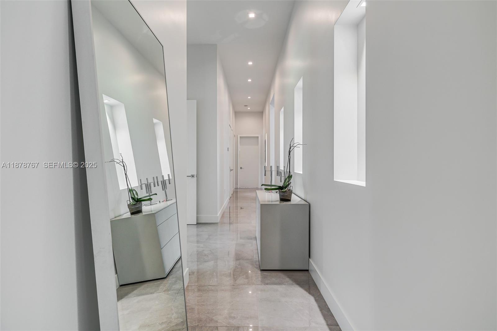 17950 Southwest 192nd Street Miami, FL 33187 - Photo 35 of 53 a view of an entryway with furniture