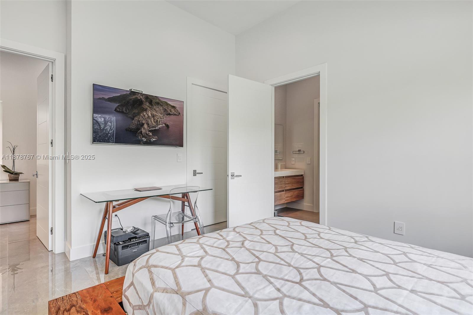 17950 Southwest 192nd Street Miami, FL 33187 - Photo 37 of 53 a bedroom with a bed and a chair