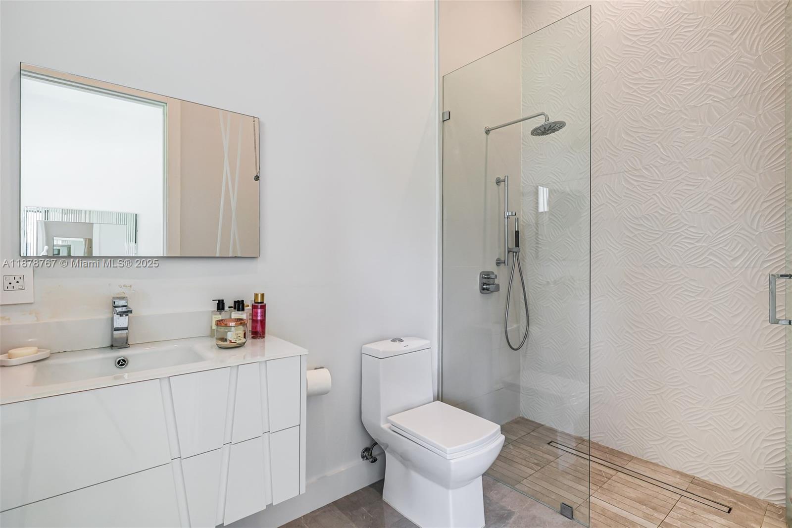 17950 Southwest 192nd Street Miami, FL 33187 - Photo 44 of 53 a bathroom with a sink toilet and shower