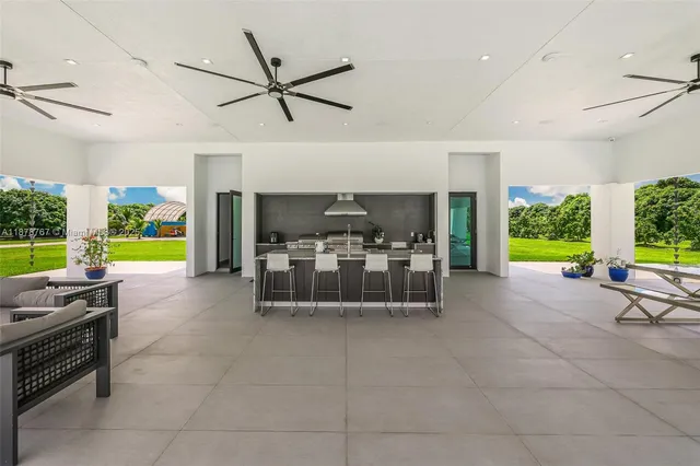 a view of a garden with a building in the background