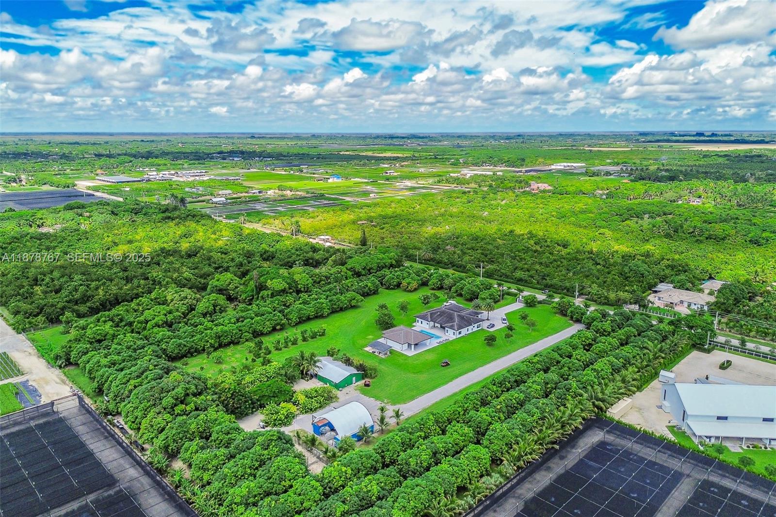17950 Southwest 192nd Street Miami, FL 33187 - Photo 49 of 53 a view of a garden with an outdoor space