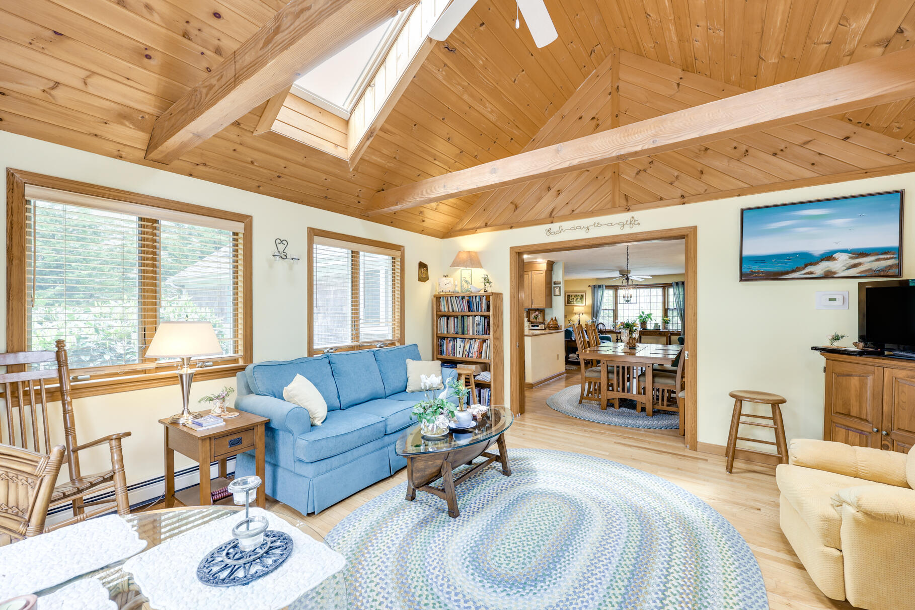 65 Continental Drive Harwich, MA 02645 - Photo 15 of 34 a living room with furniture and a large window
