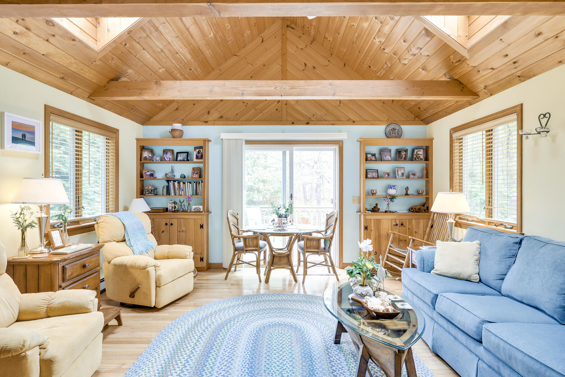 65 Continental Drive Harwich, MA 02645 - Photo 17 of 34 a living room with furniture and a large window